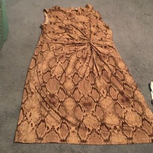 I am selling a snake print dress it goes down to the knees